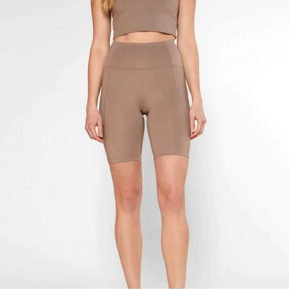 Girlfriend collective high rise biker shorts tan
